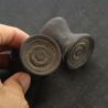 Antique Dayak ironwood ear plugs shown in hand side angle 4