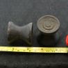 Antique Dayak ironwood ear plugs pair with ruler for size reference