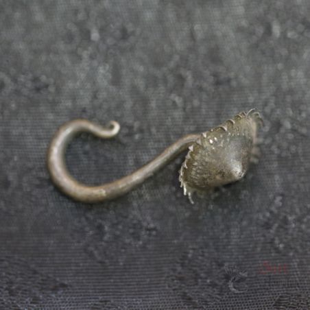 TOP SIDE ANGLE-2: Traditional long hook earring with flower terminal, top and side angle showing curved hook and aged patina