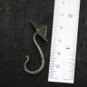 with ruler -1: Measurement view of long hook earring with ruler indicating length