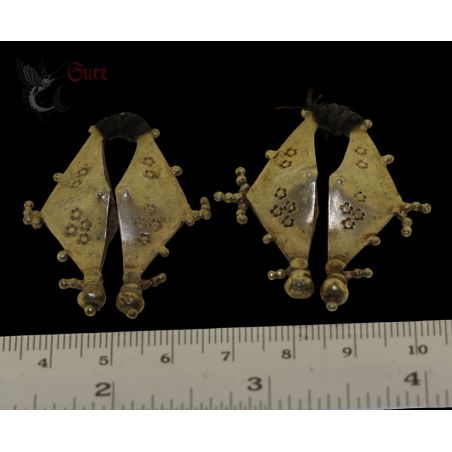 Ethnographic Central Flores earrings ruler for scale