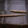 Antique Burmese tattoo tool with figurative handle top side angle