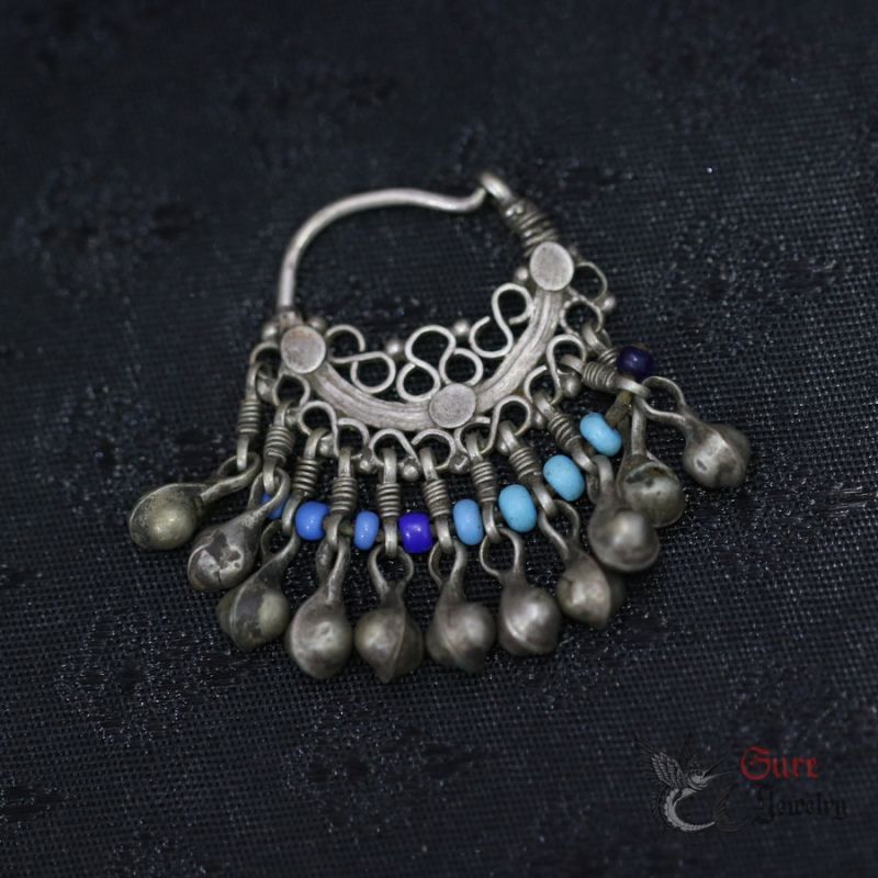 Vintage Central Asian tribal silver earring crescent design top side angle