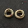 Ta Oy copper alloy spiral ear ornaments pair top view from Vietnam Laos border region