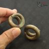 Vietnam Laos tribal ear weights pair side profile with natural patina hand held